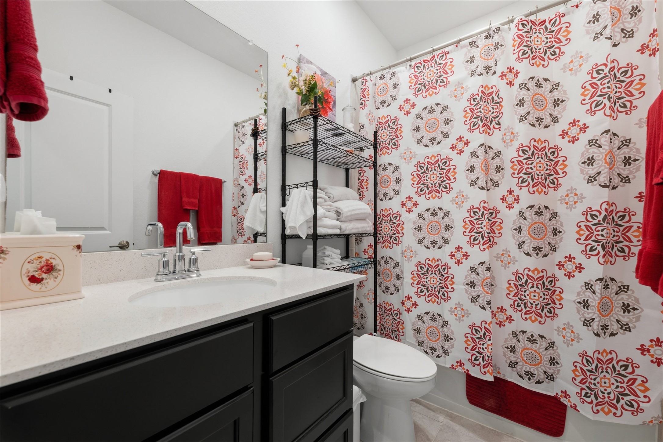 1000 Moose Road Hutto, TX 78634 - Photo 15 of 29 Bathroom featuring vanity and light tile patterned floors