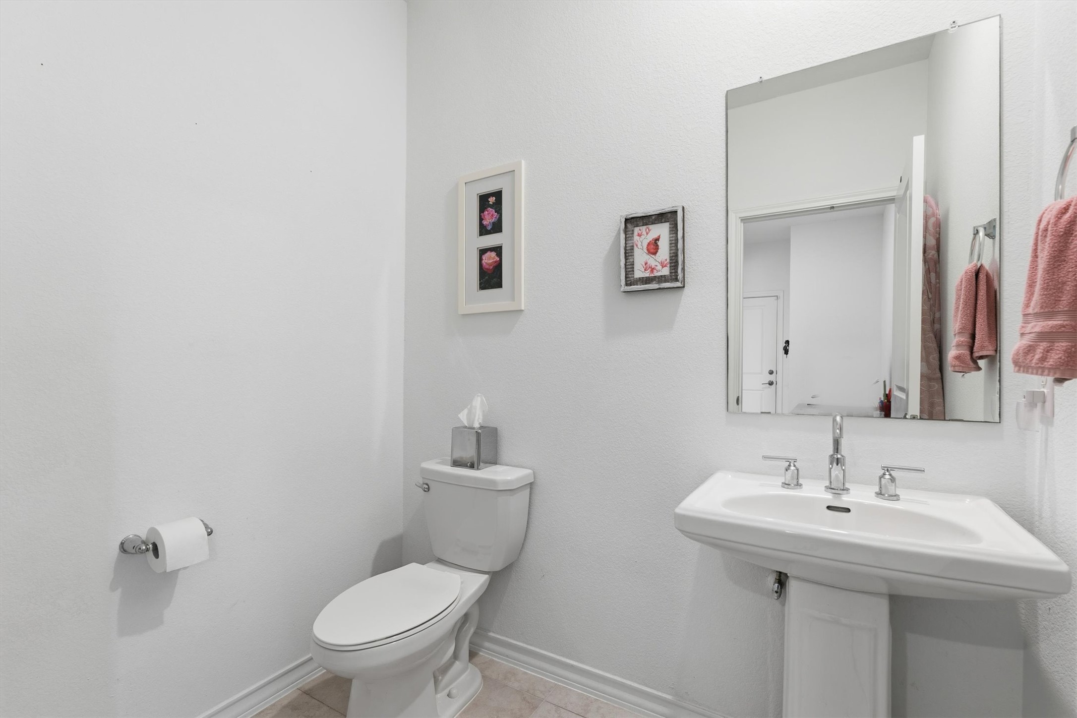 1000 Moose Road Hutto, TX 78634 - Photo 18 of 29 Bathroom with toilet and light tile patterned floors