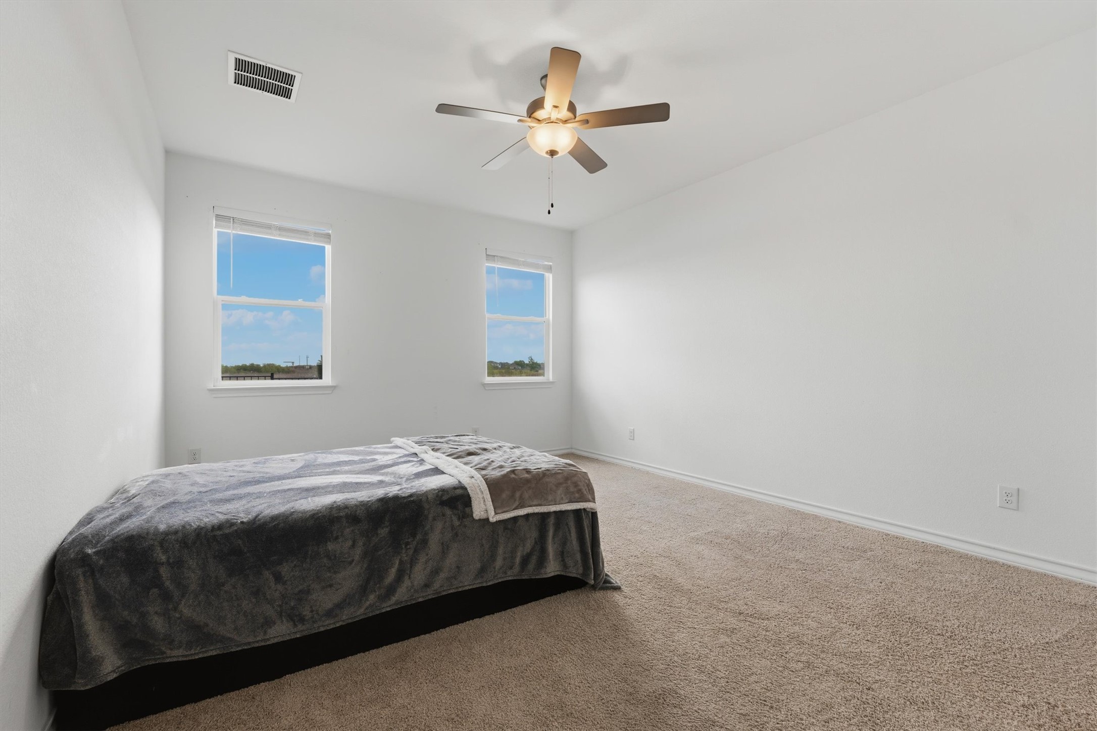1000 Moose Road Hutto, TX 78634 - Photo 20 of 29 Bedroom with carpet flooring and a ceiling fan
