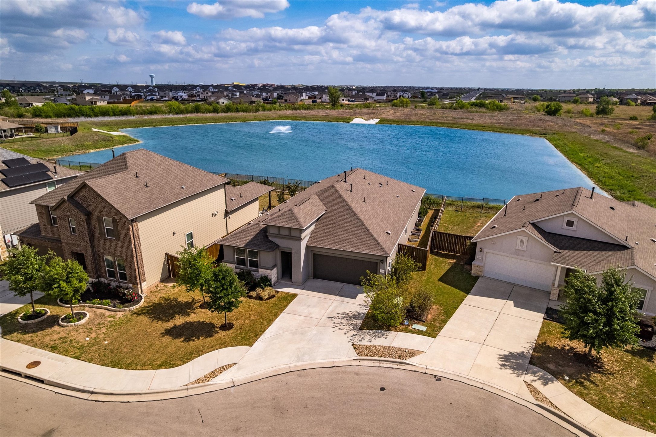 1000 Moose Road Hutto, TX 78634 - Photo 26 of 29 Aerial view of residential area with a nearby body of water