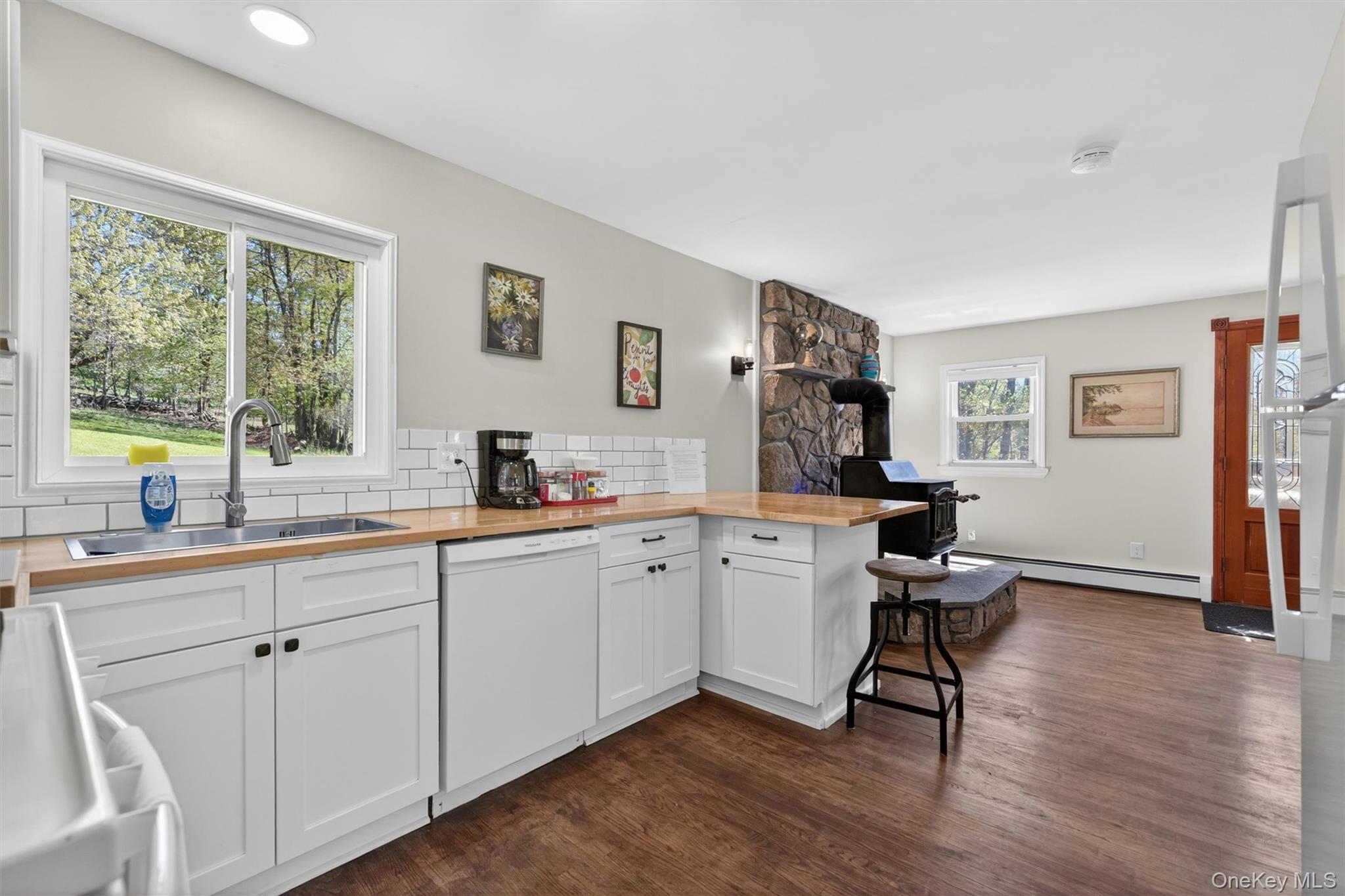 35 Yaun Road Livingston Manor, NY 12758 - Photo 14 of 38 a kitchen with a sink cabinets and wooden floor