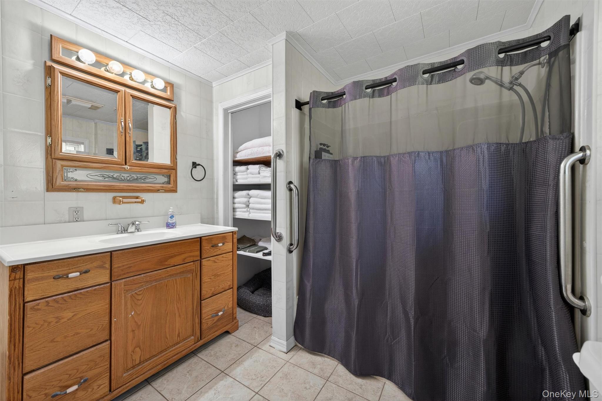 35 Yaun Road Livingston Manor, NY 12758 - Photo 20 of 38 a bathroom with a sink mirror and a shower