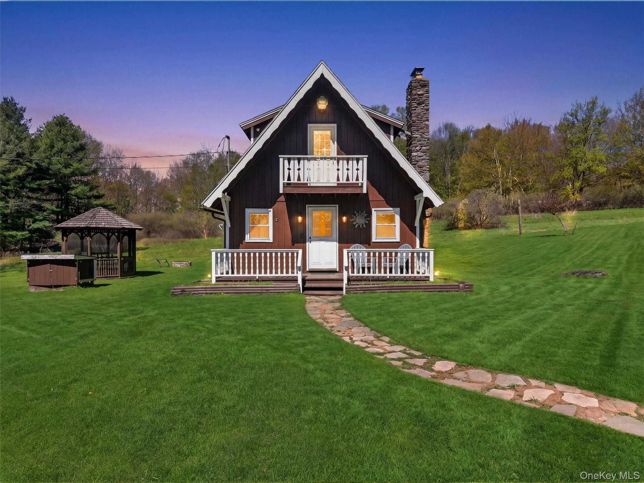 35 Yaun Road Livingston Manor, NY 12758 - Photo 2 of 38 a front view of a house with a yard and trees