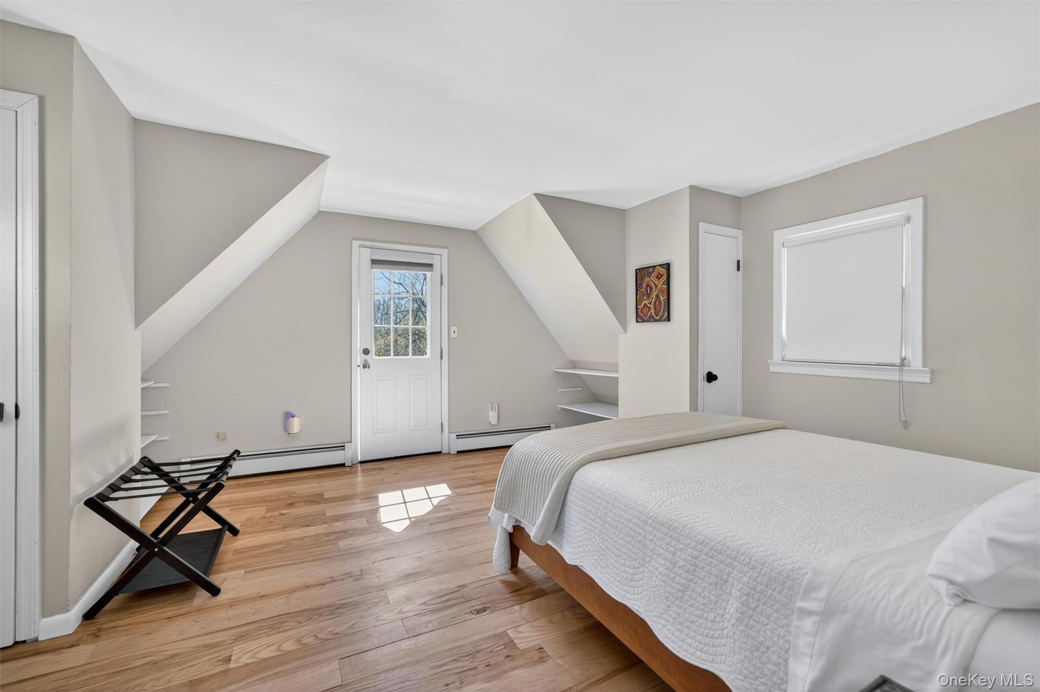 35 Yaun Road Livingston Manor, NY 12758 - Photo 23 of 38 a bedroom with a bed and a desk