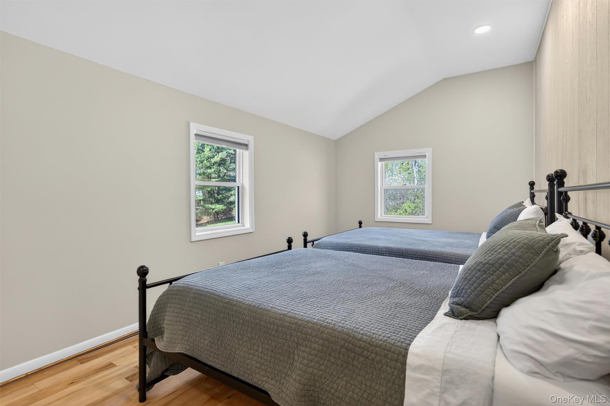 35 Yaun Road Livingston Manor, NY 12758 - Photo 27 of 38 a bedroom with a bed a window and painting on the wall