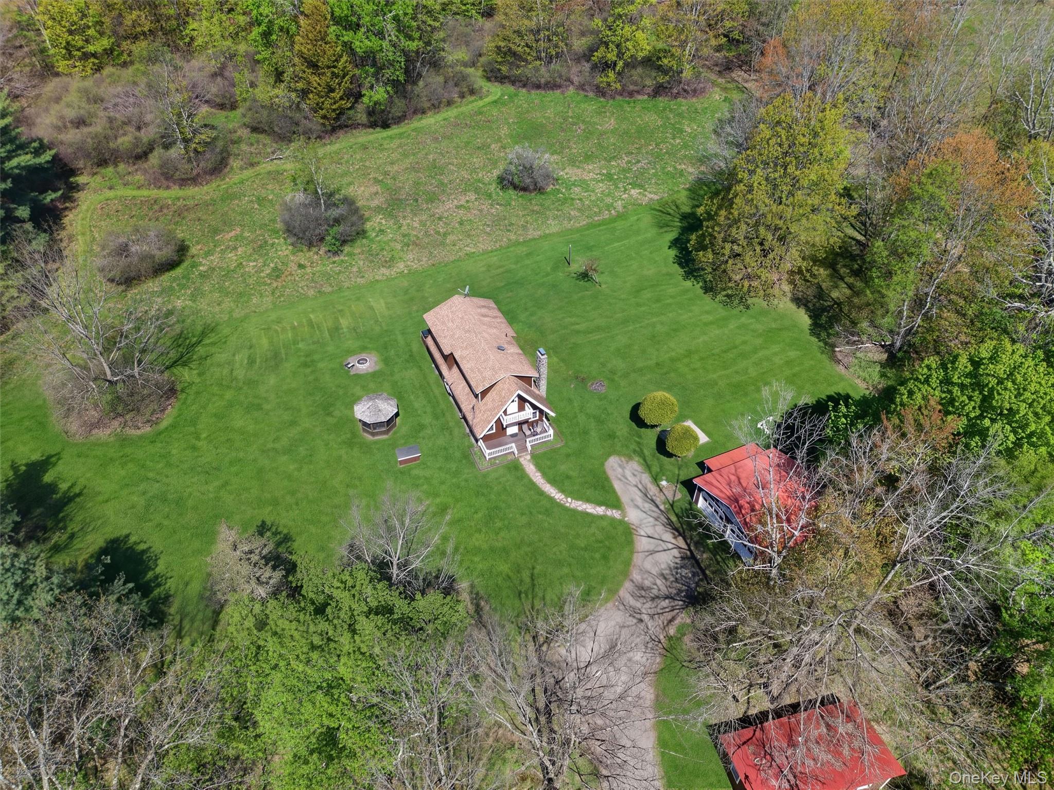 35 Yaun Road Livingston Manor, NY 12758 - Photo 36 of 38 a view of a fire pit with large trees