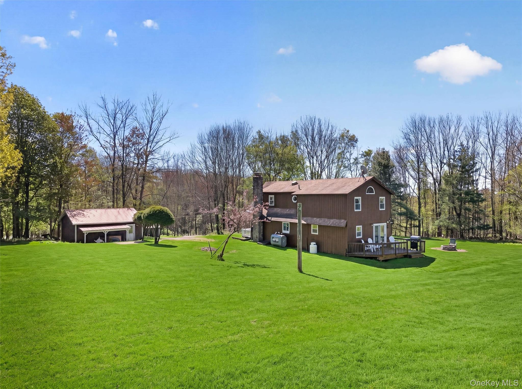 35 Yaun Road Livingston Manor, NY 12758 - Photo 4 of 38 a view of a house with a yard and sitting area
