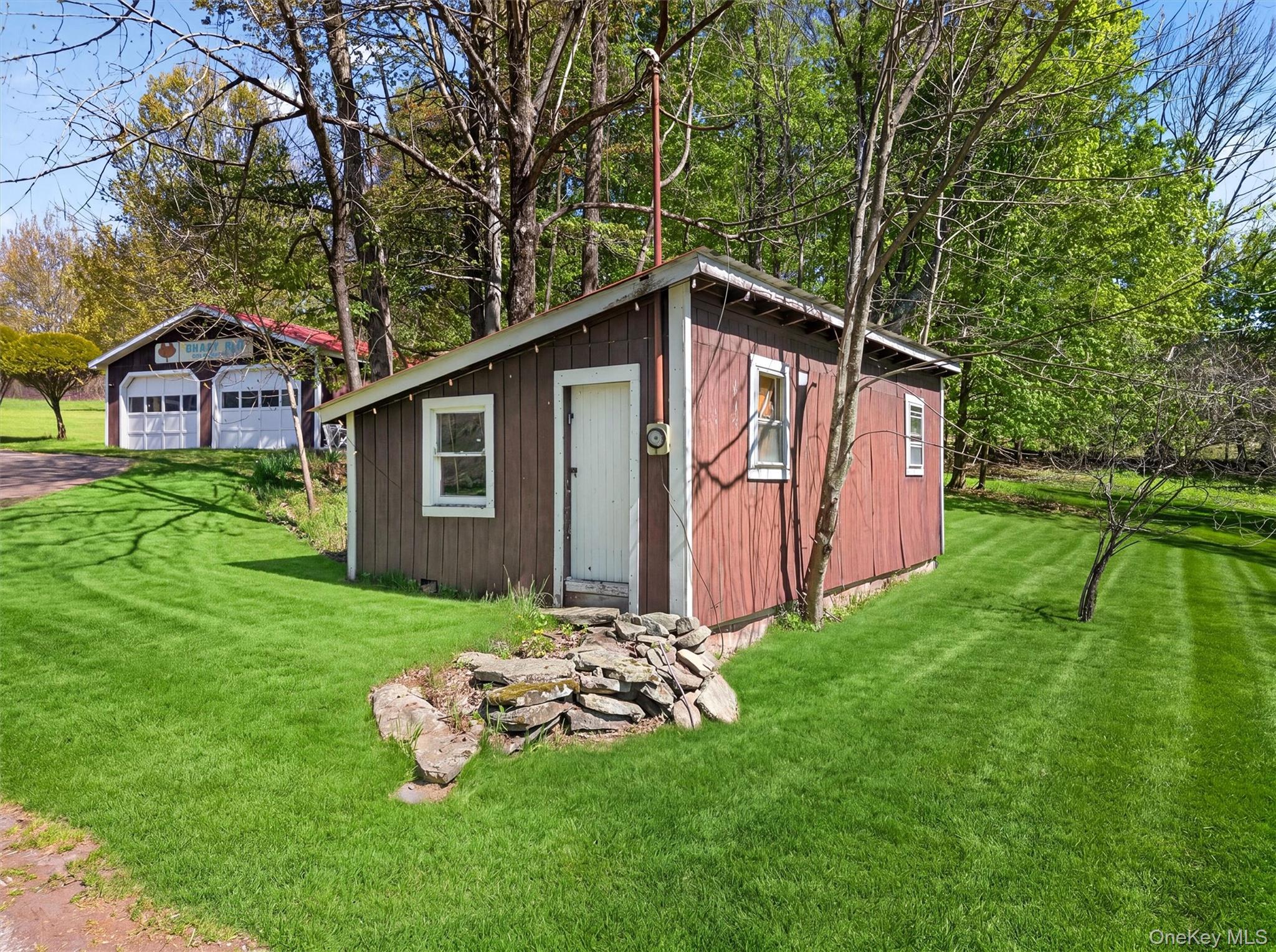 35 Yaun Road Livingston Manor, NY 12758 - Photo 6 of 38 a front view of a house with garden
