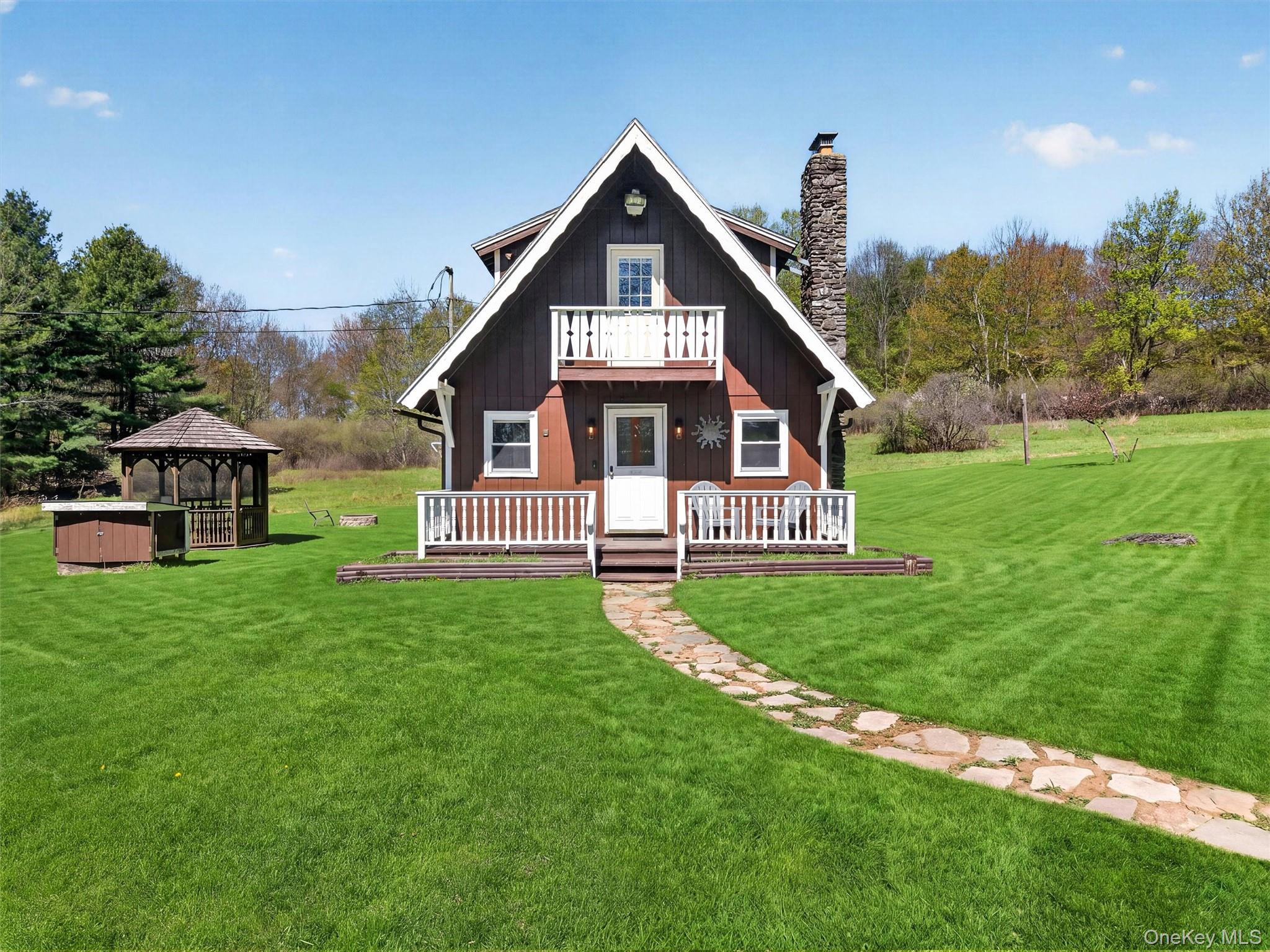 35 Yaun Road Livingston Manor, NY 12758 - Photo 7 of 38 a view of a house with a big yard potted plants and large tree