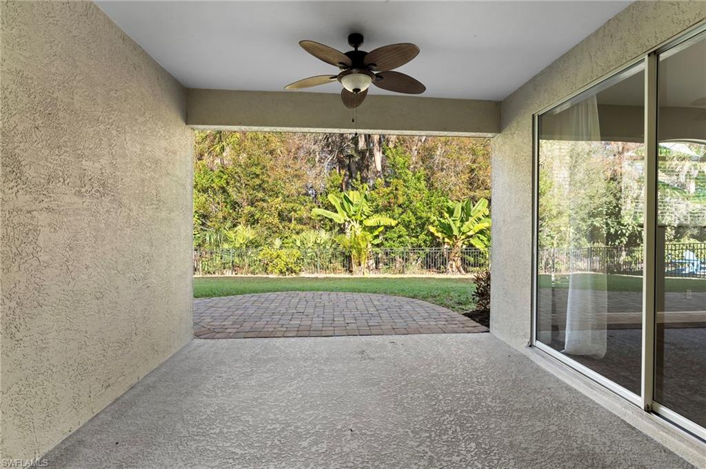 22932 Forest Ridge Drive Estero, FL 33928 - Photo 29 of 41 a view of room with window and a ceiling fan