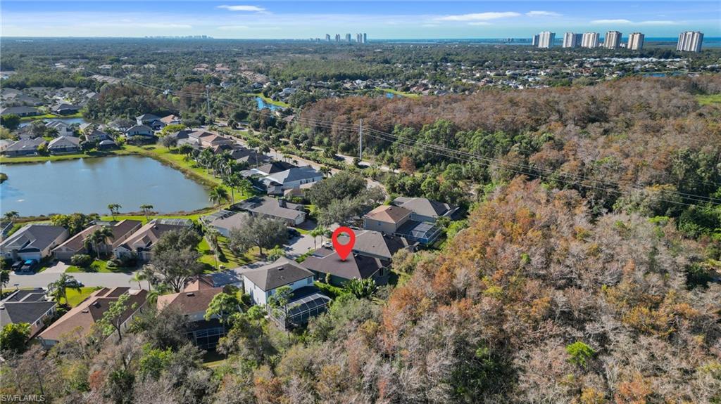 22932 Forest Ridge Drive Estero, FL 33928 - Photo 33 of 41 an aerial view of a houses with a yard