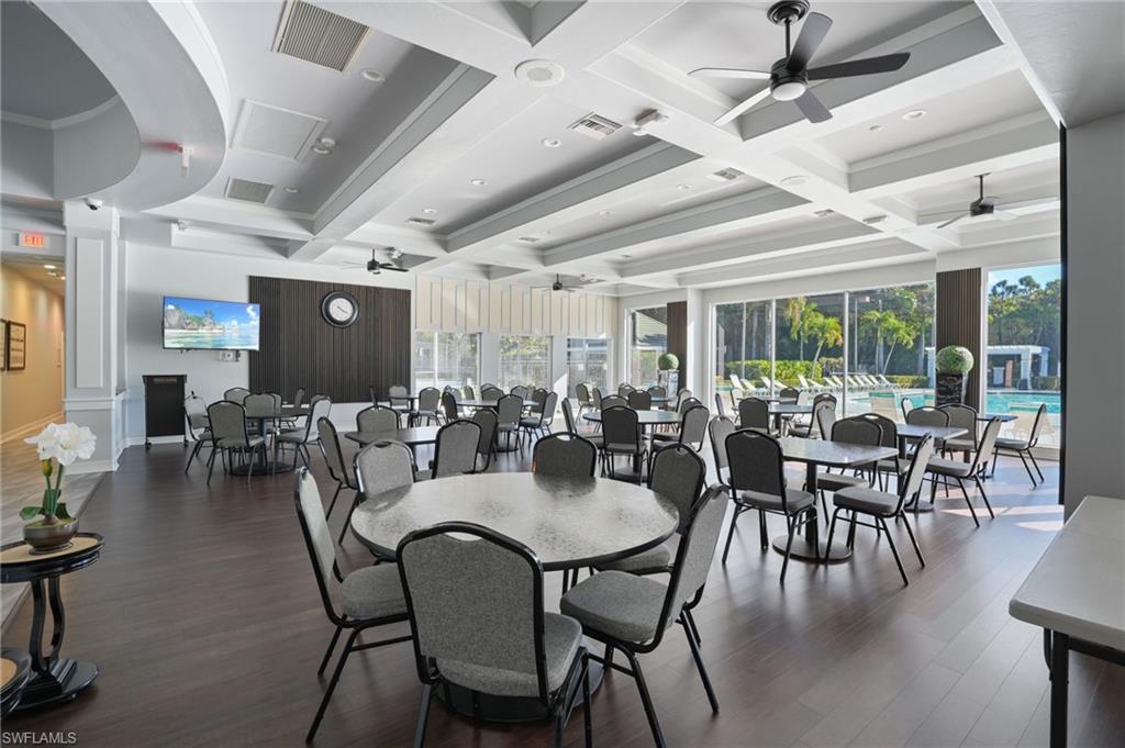 22932 Forest Ridge Drive Estero, FL 33928 - Photo 41 of 41 a view of a dining room with furniture and wooden floor