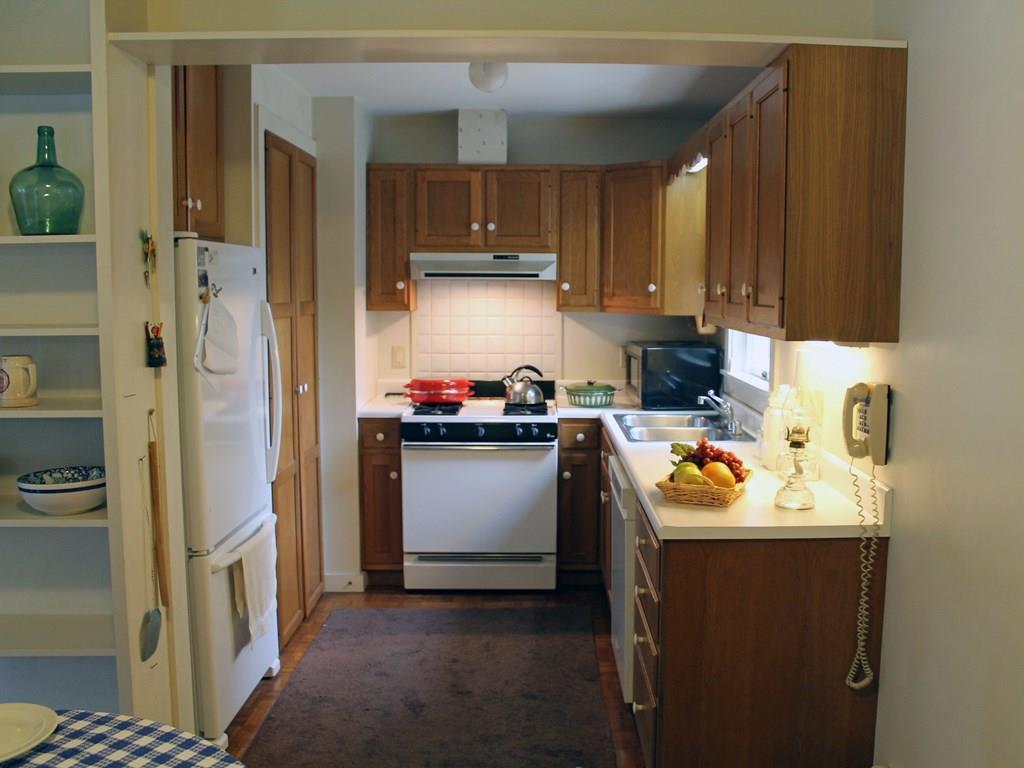 831 Indian Point Road Mount Desert, ME 04660 - Photo 7 of 23 Kitchen. Large pantry closet to the...