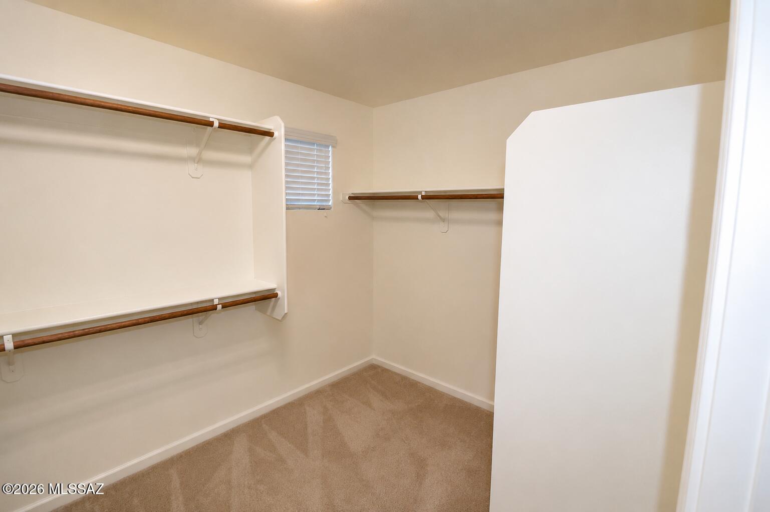 11484 East Desert Raptor Loop Tucson, AZ 85747 - Photo 10 of 28 a view of small space with racks on the wall