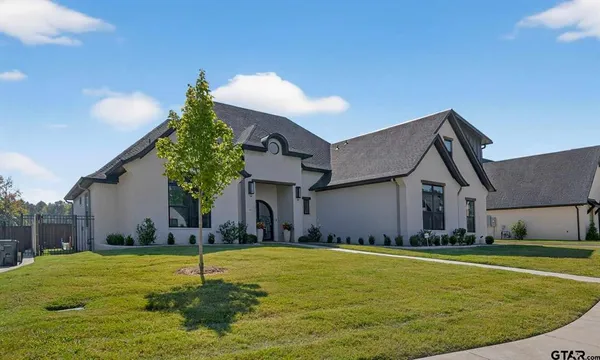 a house view with a swimming pool