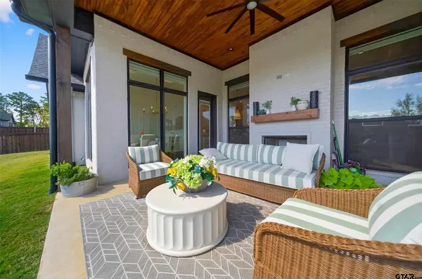 a front view of a house having outdoor seating