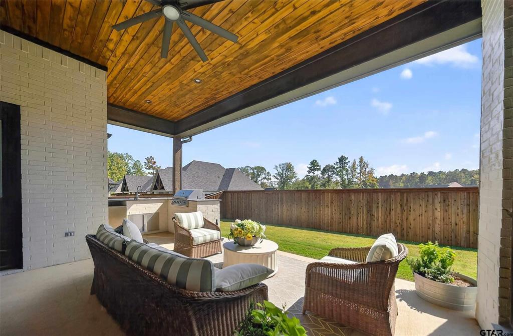 1572 Maple Lane Tyler, TX 75703 - Photo 40 of 40 a view of a patio with couches chairs and a table