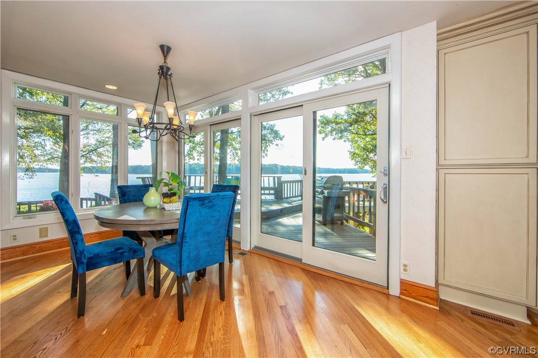 4206 Winterberry Court Midlothian, VA 23112 - Photo 14 of 50 a view of a dining room with furniture window and wooden floor