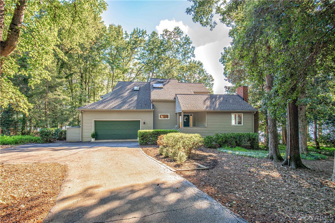 4206 Winterberry Court Midlothian, VA 23112 - Photo 2 of 50 a front view of a house with garden