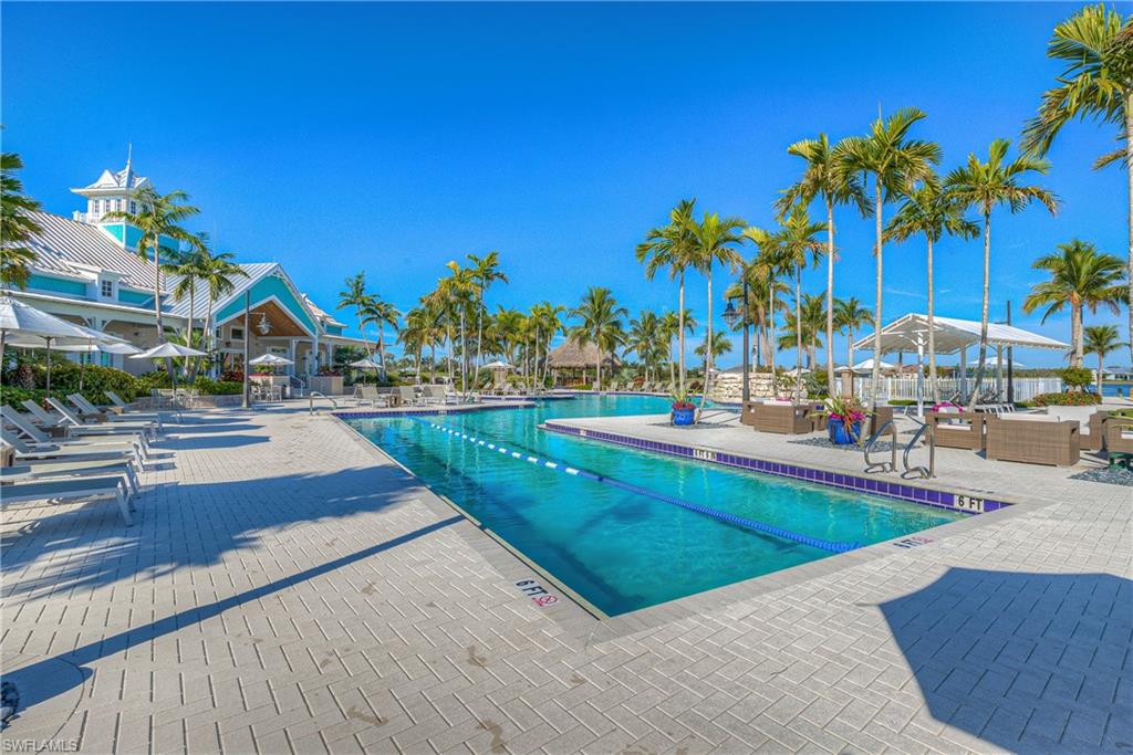 14559 Edgewater Circle Naples, FL 34114 - Photo 31 of 49 a view of outdoor space yard and swimming pool