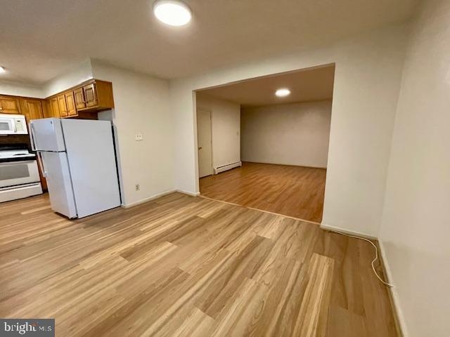 141 East 4th Avenue, Unit C6 Conshohocken, PA 19428 - Photo 3 of 7 a view of a room with wooden floor and a sink