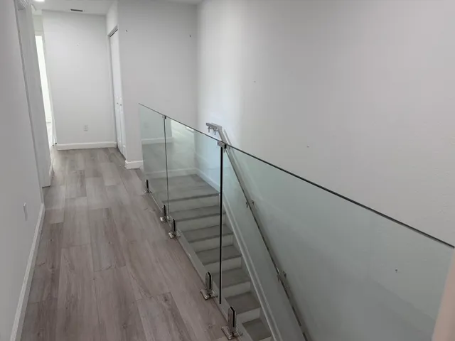 a view of entryway with wooden floor