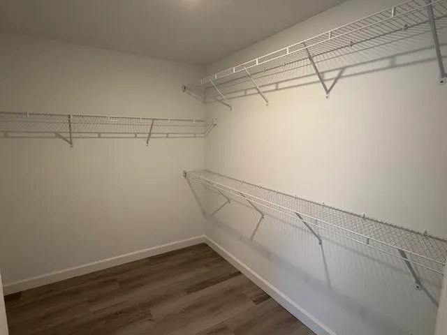a view of a room with racks on the wall
