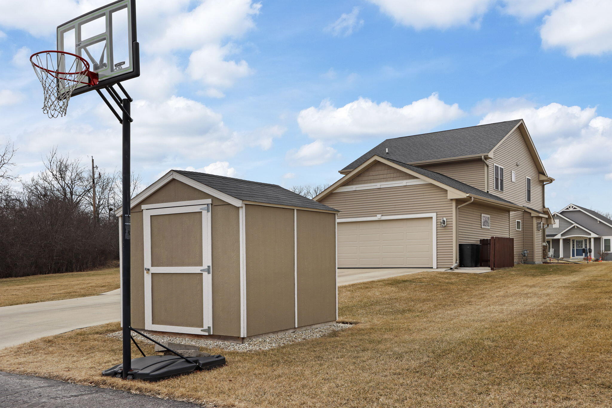 1172 Springbrook Drive Burlington, WI 53105 - Photo 33 of 40 Level drive, attached garage, shed