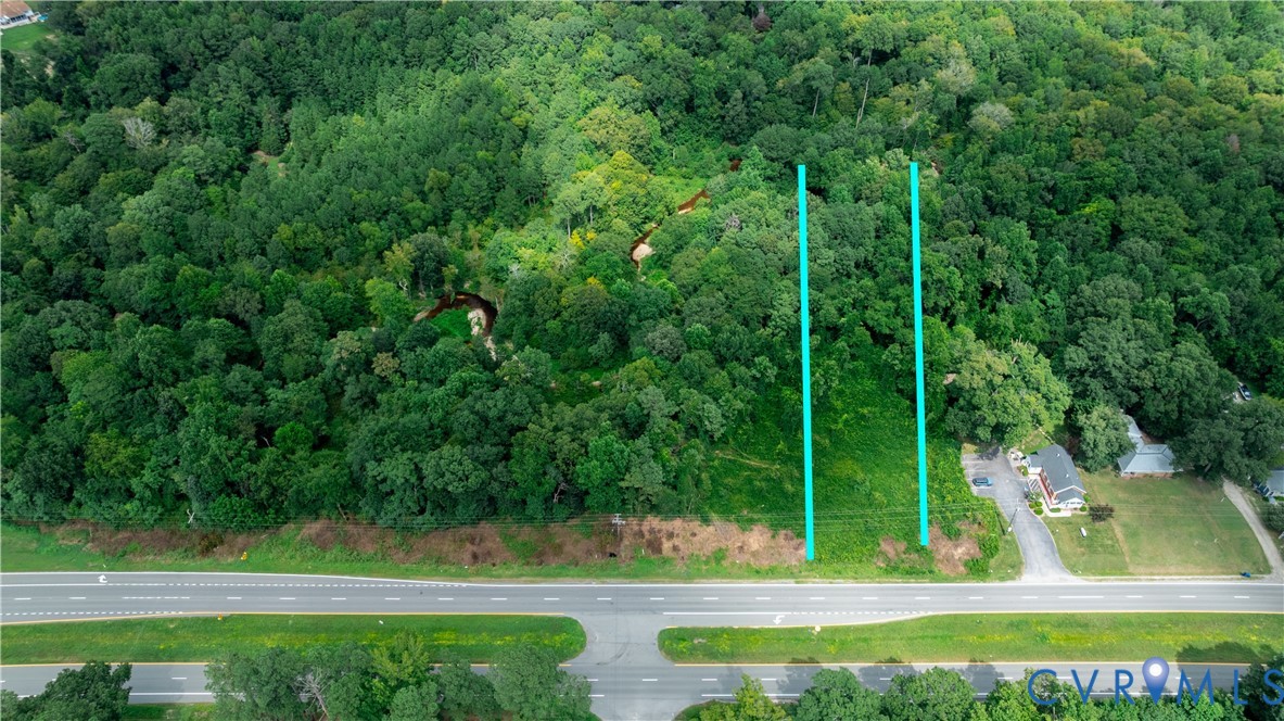 a view of a yard with a small pool