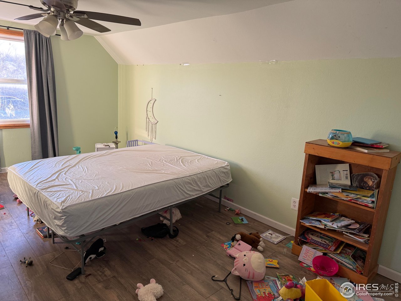 375 West 7th Street Akron, CO 80720 - Photo 31 of 50 a bedroom with a bed and a table in it