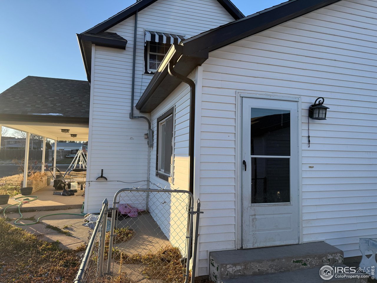 375 West 7th Street Akron, CO 80720 - Photo 35 of 50 a view of a house with a yard