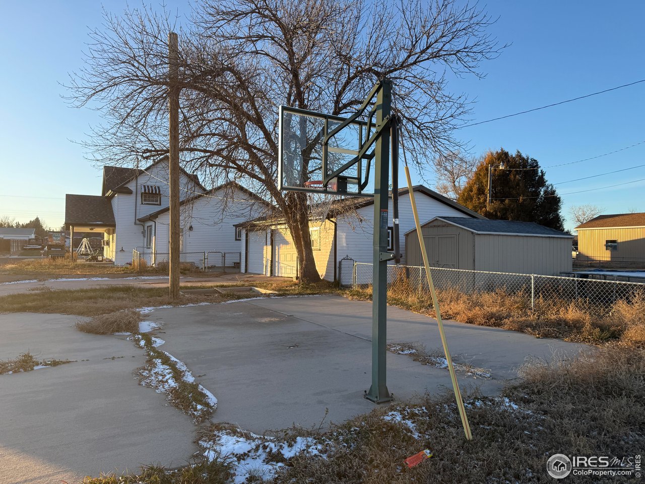 375 West 7th Street Akron, CO 80720 - Photo 46 of 50 a view of a yard and car parked