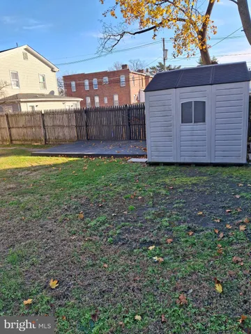 a view of a backyard with a garden