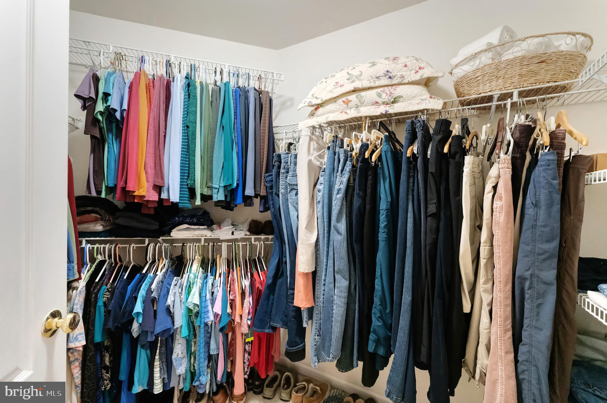 1309 Murray Downs Way Reston, VA 20194 - Photo 28 of 63 a view of walk in closet with clothes