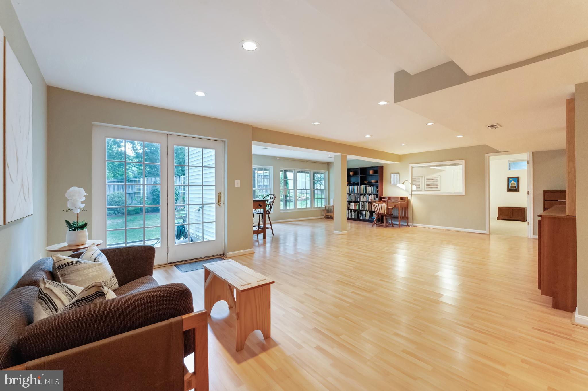 1309 Murray Downs Way Reston, VA 20194 - Photo 36 of 63 a living room with furniture and a large window