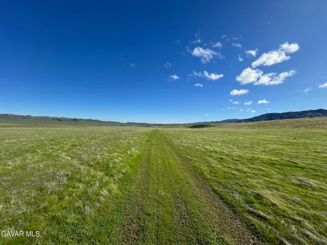 a view of a lake from a balcony