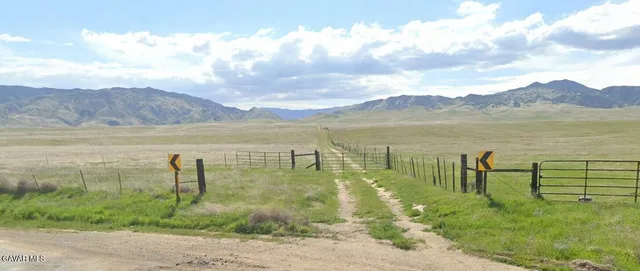 a view of a lake with a mountain in the background