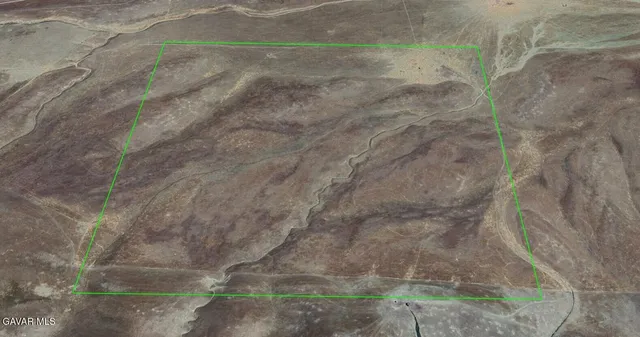 a view of a backyard of a house