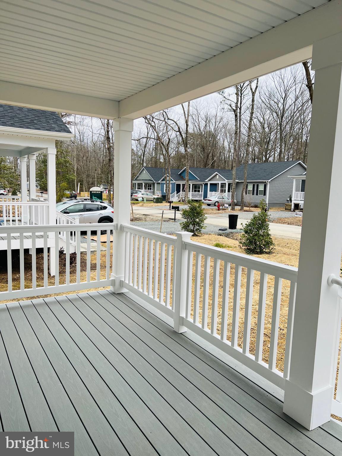 255 9th Street Colonial Beach, VA 22443 - Photo 5 of 18 a view of a house with wooden deck