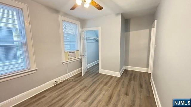 760 Hamilton Street, Unit 1 Harrison, NJ 07029 - Photo 11 of 23 a view of an empty room with wooden floor and a window