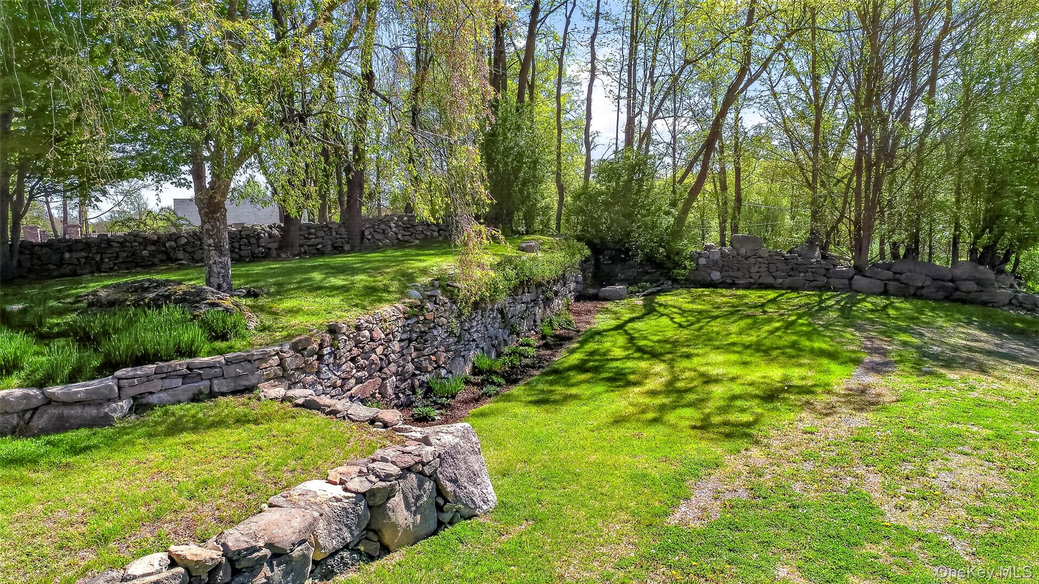 114 Last Road Middletown, NY 10941 - Photo 13 of 50 Rock walls, mature perennials and ornamental trees give this property so much character