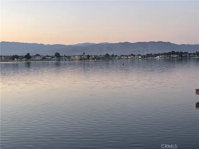 a view of a lake with a city