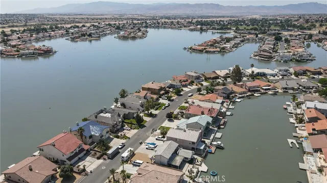 a view of a backyard of the house