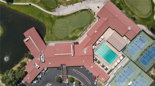 a view of residential houses with outdoor space