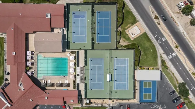 a view of swimming pool with outdoor seating