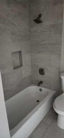 a bathroom with a bathtub