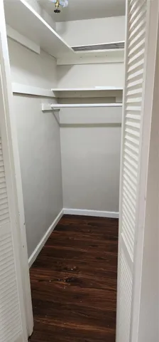 a view of small space with racks on the wall