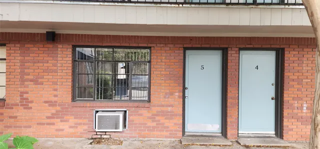 a front view of a building with a entryway