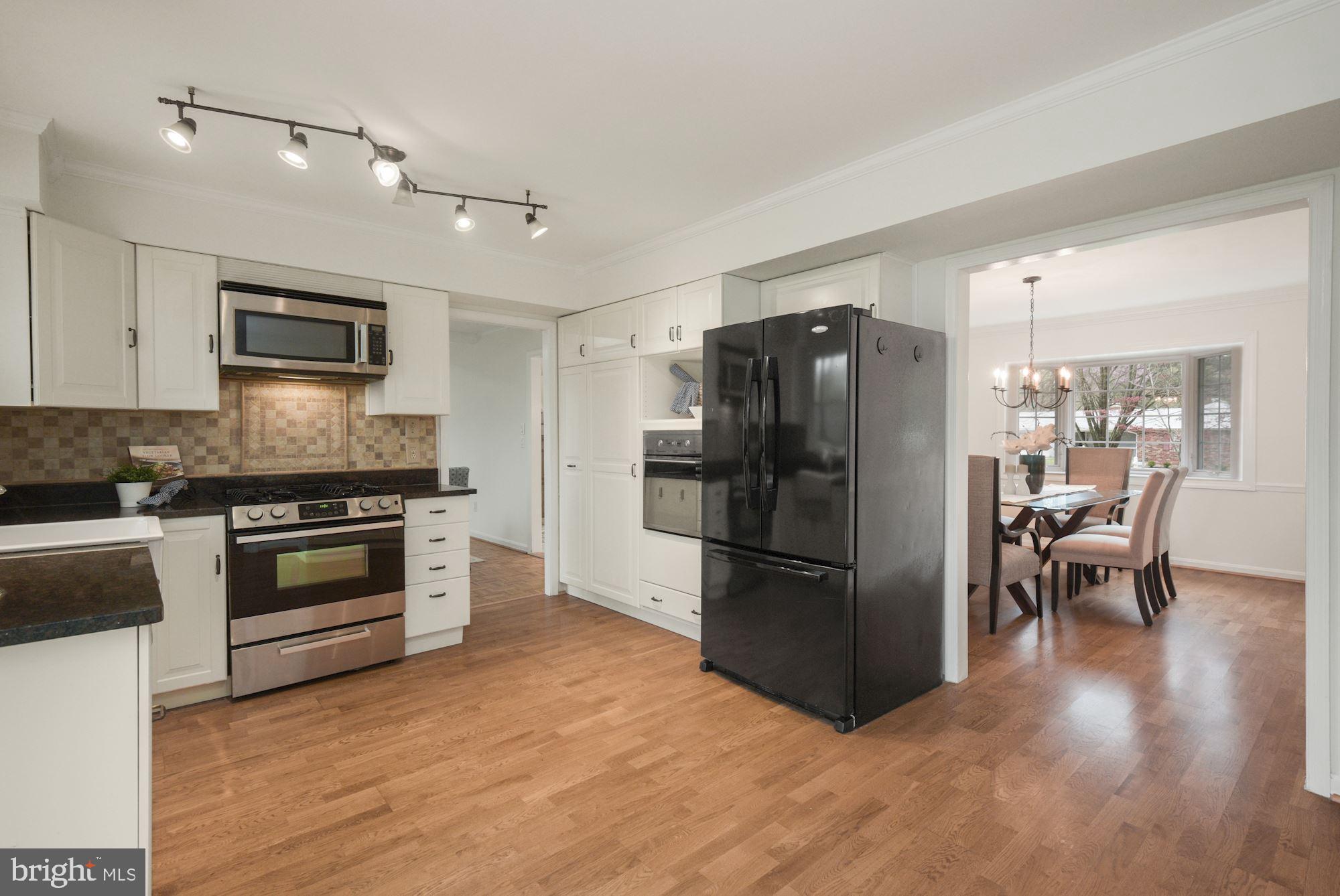 3224 Birchtree Lane Silver Spring, MD 20906 - Photo 6 of 30 Open Kitchen with Granite Counters