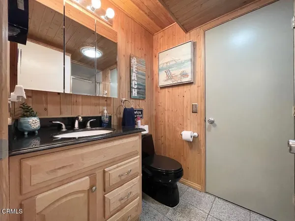 a kitchen with a sink and a cabinets